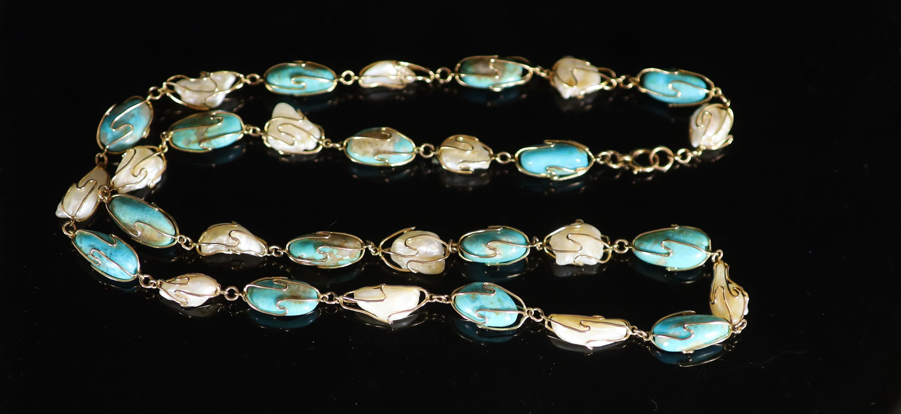 An early 20th century Liberty & Co? 15ct gold, baroque pearl and oval turquoise bead set necklace